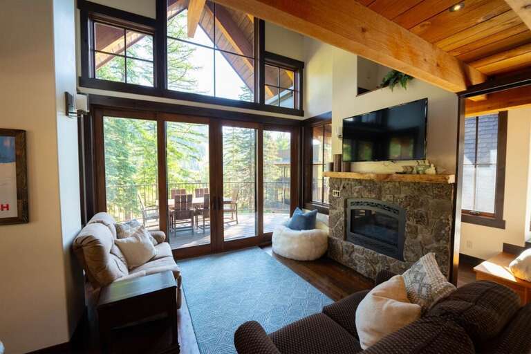 Invite in the great outdoors with the home`s panoramic mountain views | Main Level